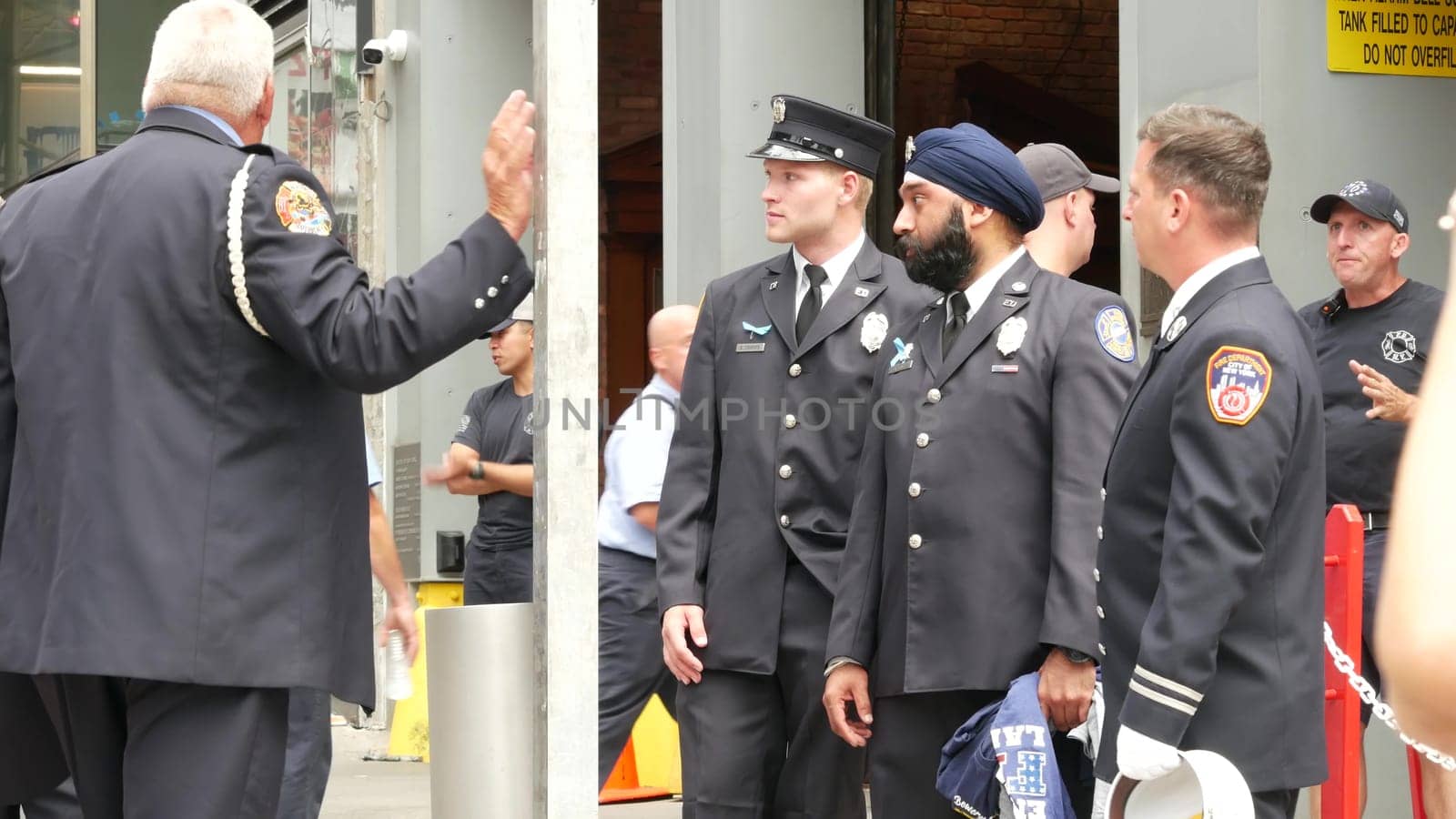 New York City, United States - 11 September 2023: Firefighters celebrate Patriot Day. 911 memorial remembrance event, FDNY commemorate anniversary. Fire Department Station, Manhattan 10 Ten Firehouse.