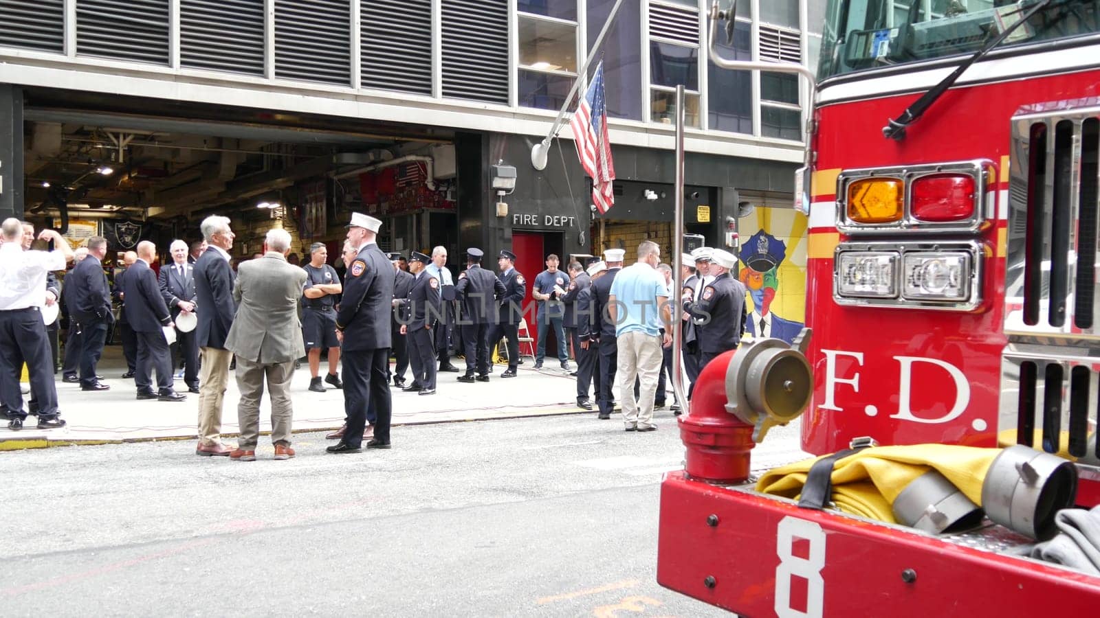 New York City, United States - 11 September 2023: Firefighters celebrate Patriot Day. 911 memorial remembrance event, FDNY commemorate anniversary. Fire Department Station, Manhattan Midtown firehouse