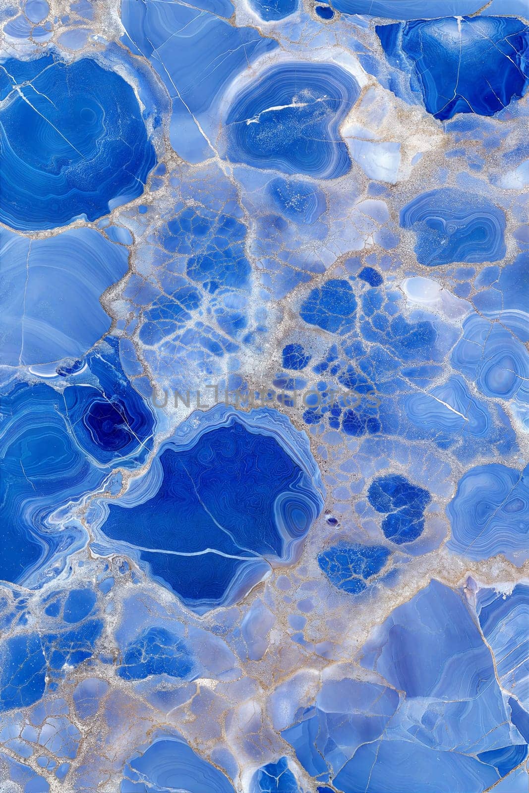 A stunning blue marble background featuring silver veins and intricate cracks, creating a luxurious and artistic design. Ideal for modern and sophisticated projects.
