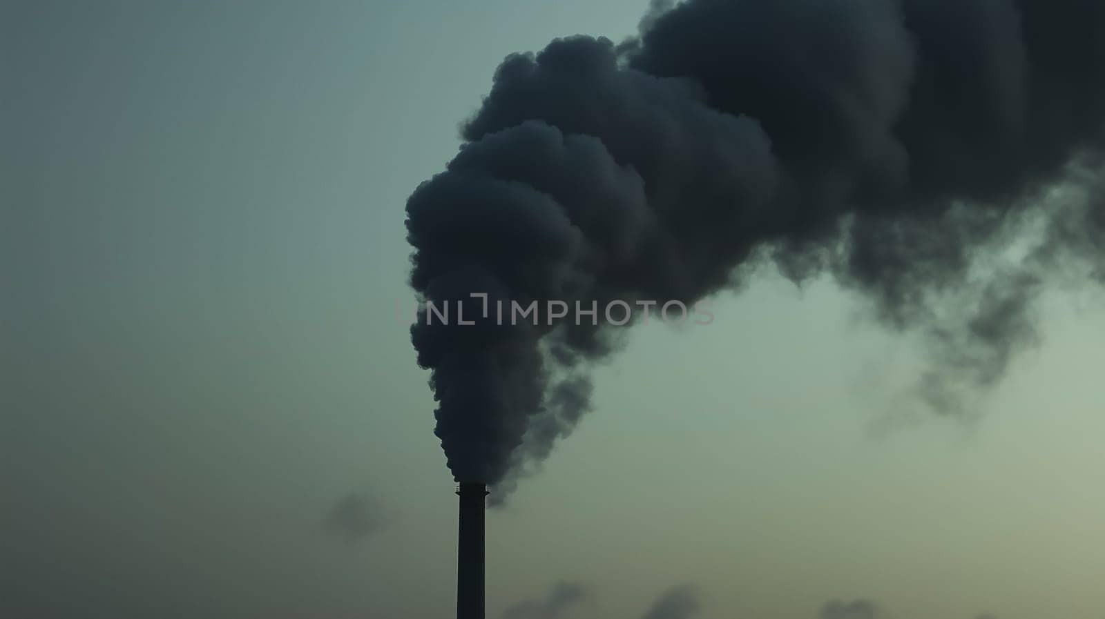 Climate change, ecology, plant pipes pollute atmosphere with thick smoke emission. Industrial factory pollution, chimney exhaust gases
