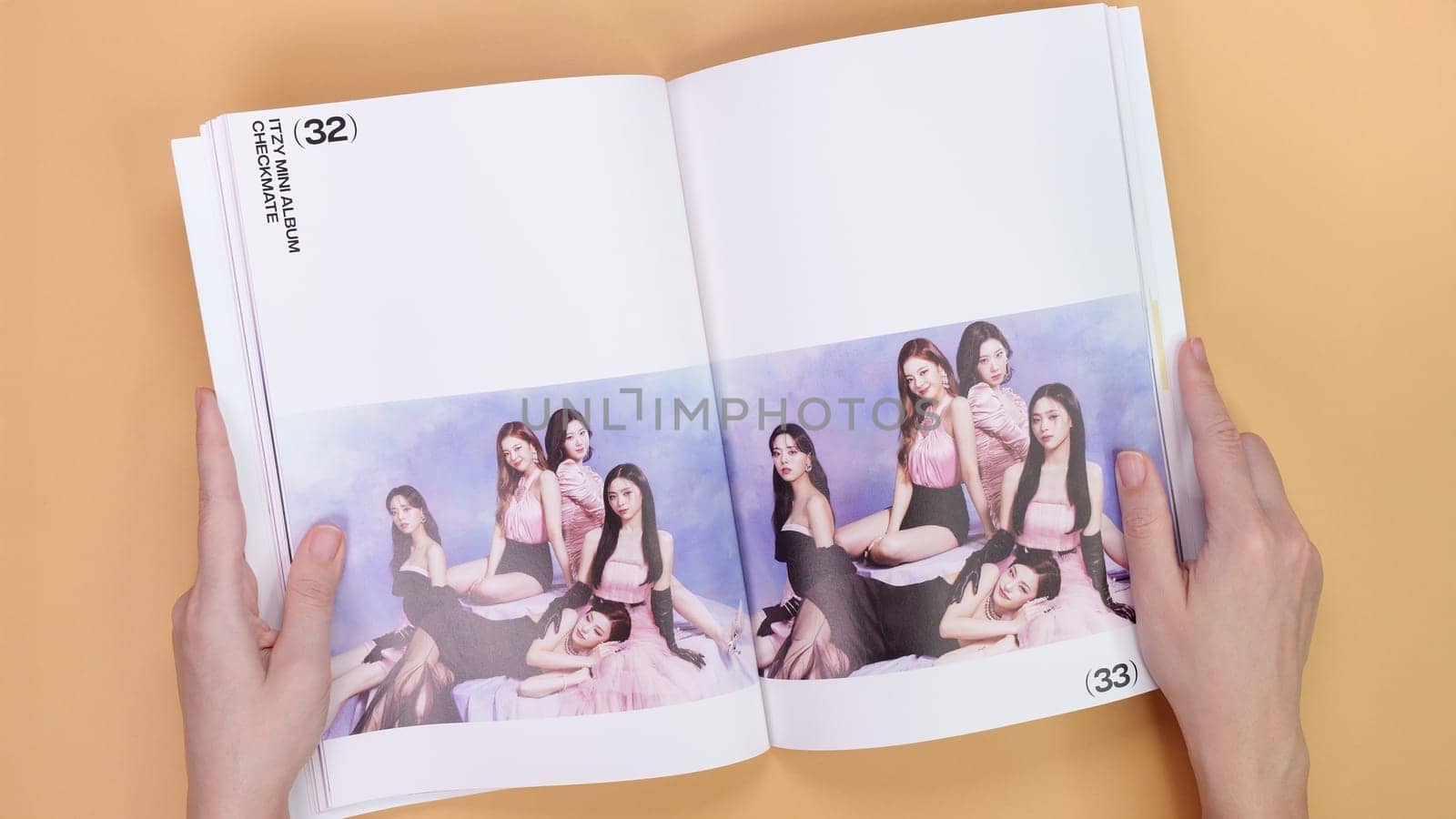 Gatineau, QC Canada - 03.16.2024: K-pop group Itzy Guess Who music Album on yellow background. Special edition music CD. South Korean girl group Itzy