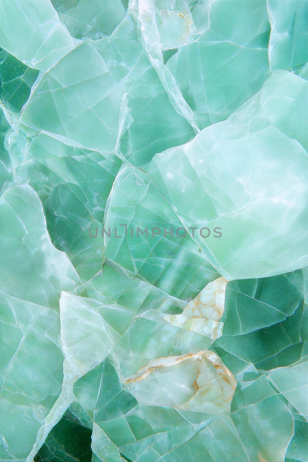A beautiful green marble background with abstract crystal-like textures and intricate veins, perfect for elegant and modern designs.