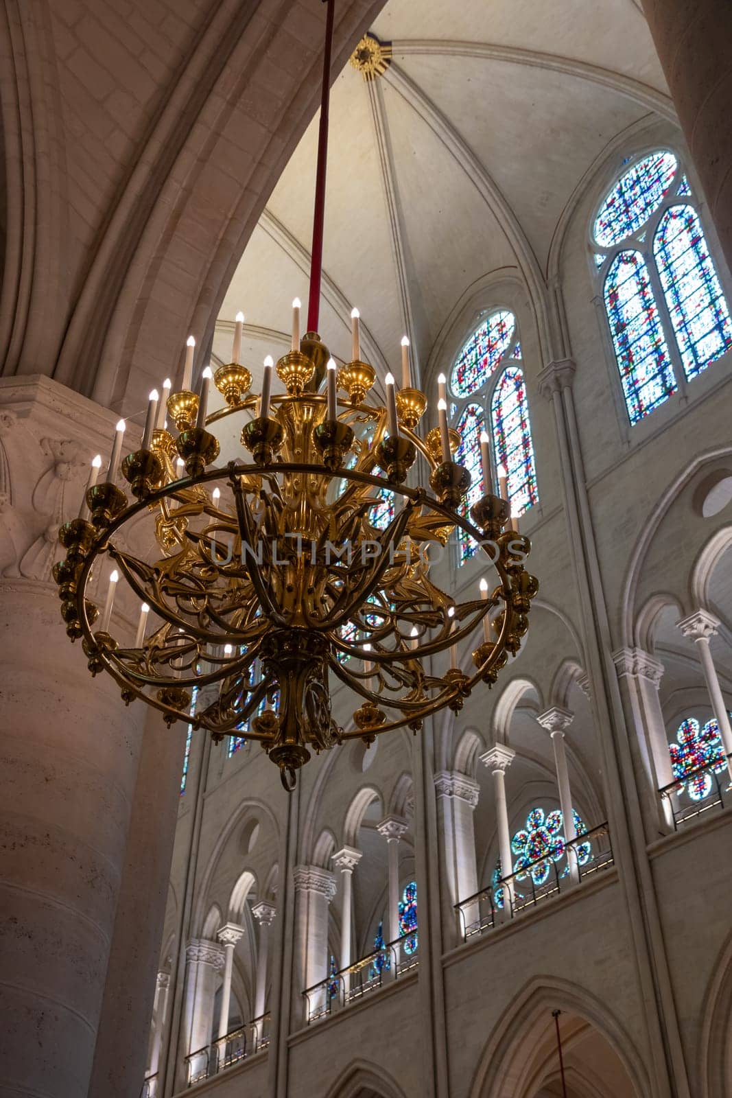 Paris, France - February 22nd 2025 : visitors in The Notre-Dame de Paris, newly re-opened cathedral restored after reconstruction, details of exterior