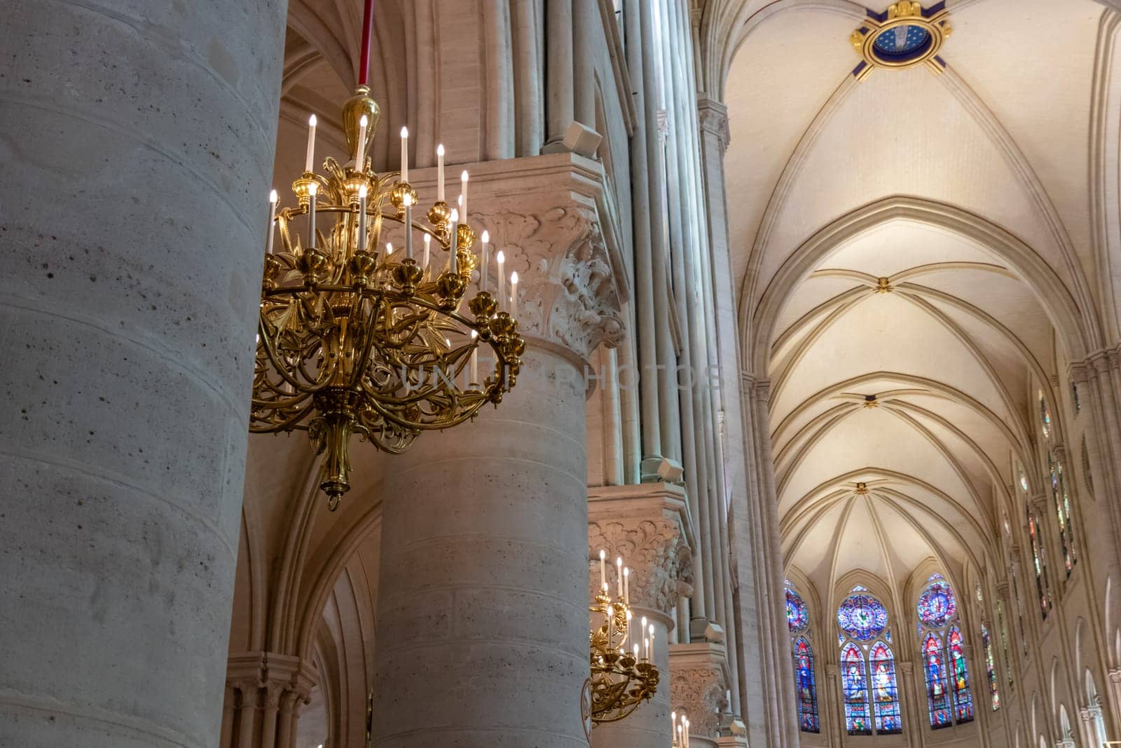 Paris, France - February 22nd 2025 : visitors in The Notre-Dame de Paris, newly re-opened cathedral restored after reconstruction, details of exterior