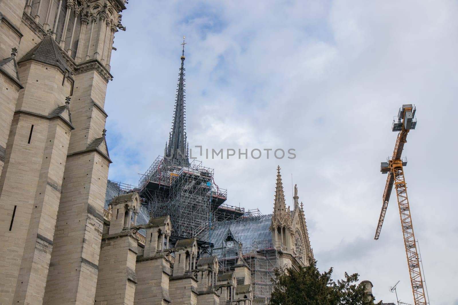 Paris, France - February 22nd 2025 : The Notre-Dame de Paris, newly re-opened cathedral restored after reconstruction, details of exterior