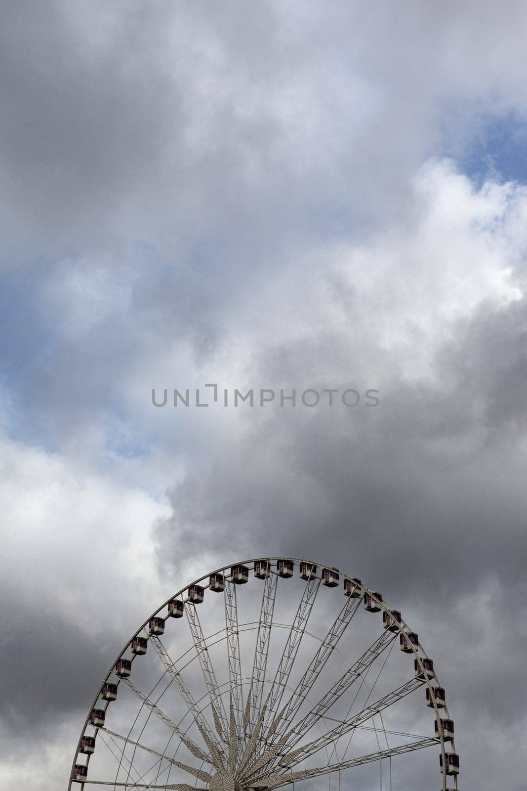 Big wheel and stormy sky