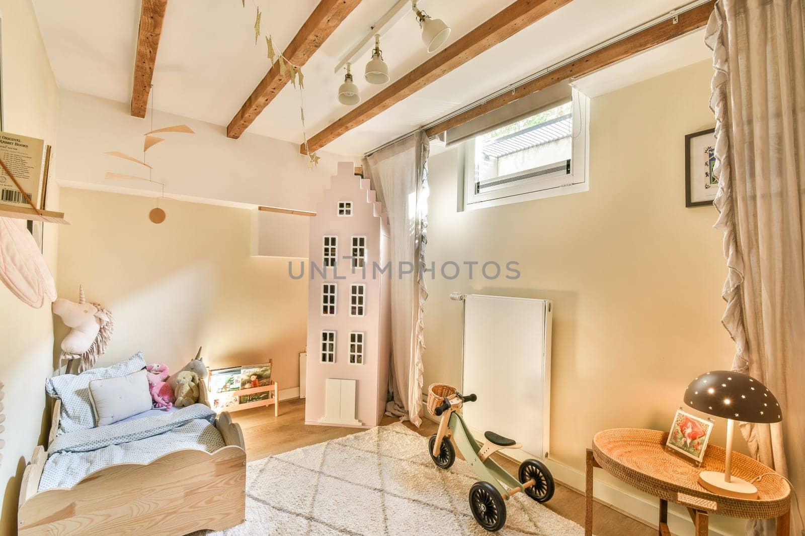 A bright and inviting children's room featuring playful decor, a wooden structure, comfortable seating, and warm lighting, perfect for creativity and relaxation.