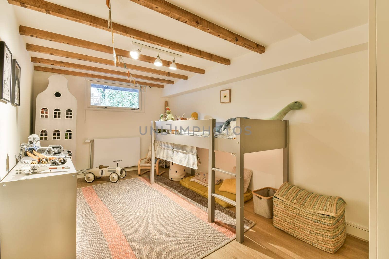 A charming children's room featuring a bunk bed, playful toys, and soft lighting, creating an inviting and whimsical atmosphere for kids.