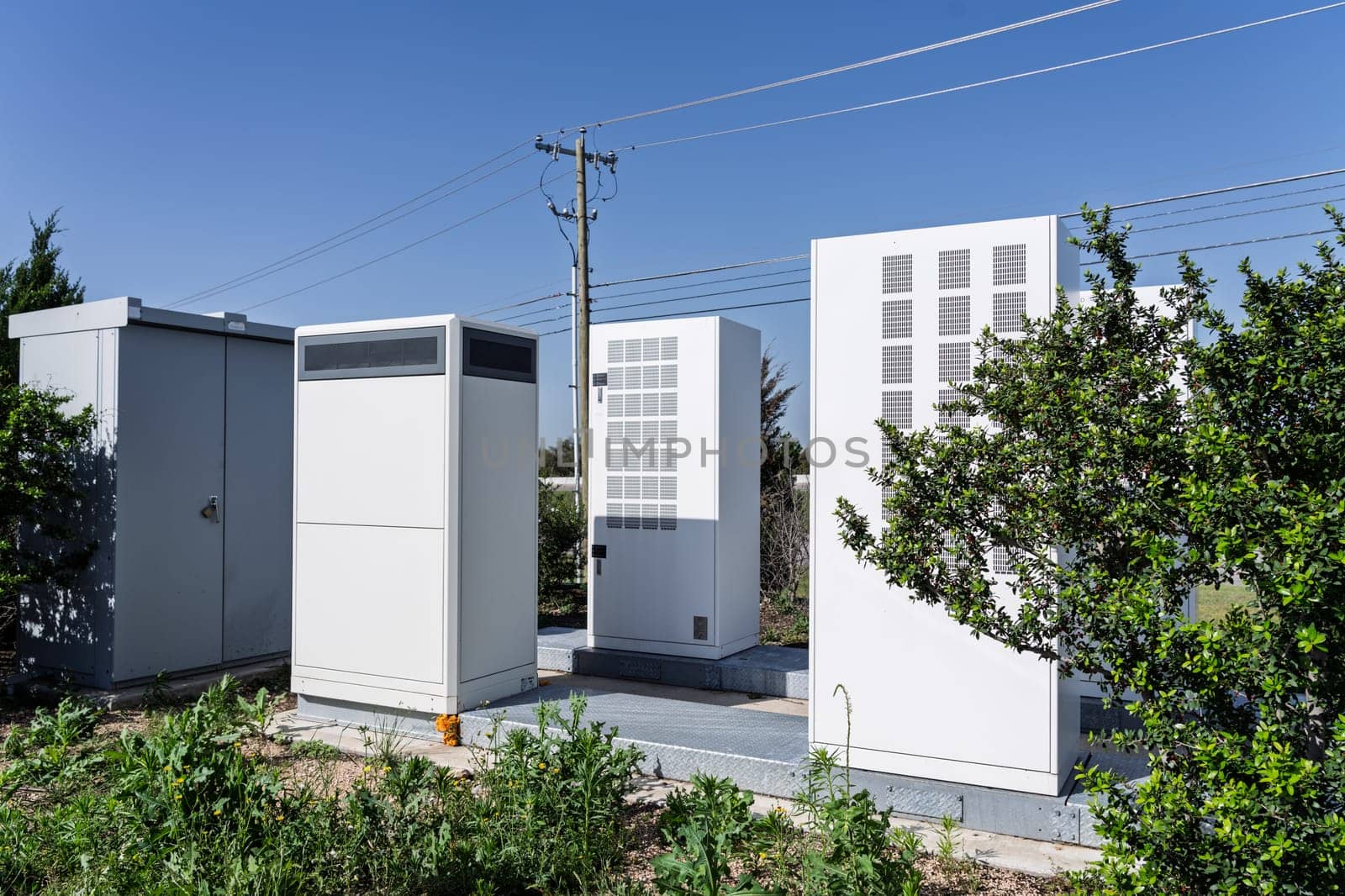 Transformers and control boxes for high speed EV car charging station with power line behind