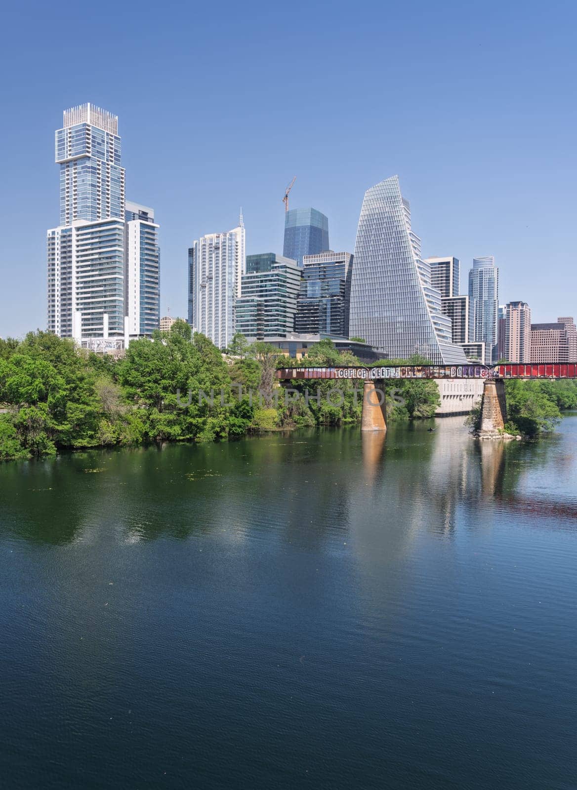 Austin, TX - 10 April 2025: Panoramic skyline of Austin Texas along Colorado River from west