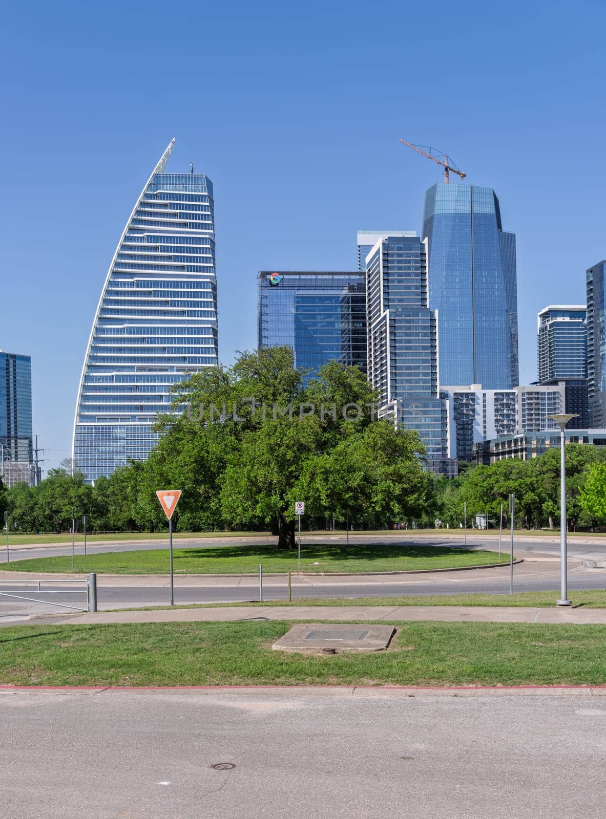 Austin, TX - 10 April 2025: Downtown City skyline with Google Block 185 and The Republic building under construction