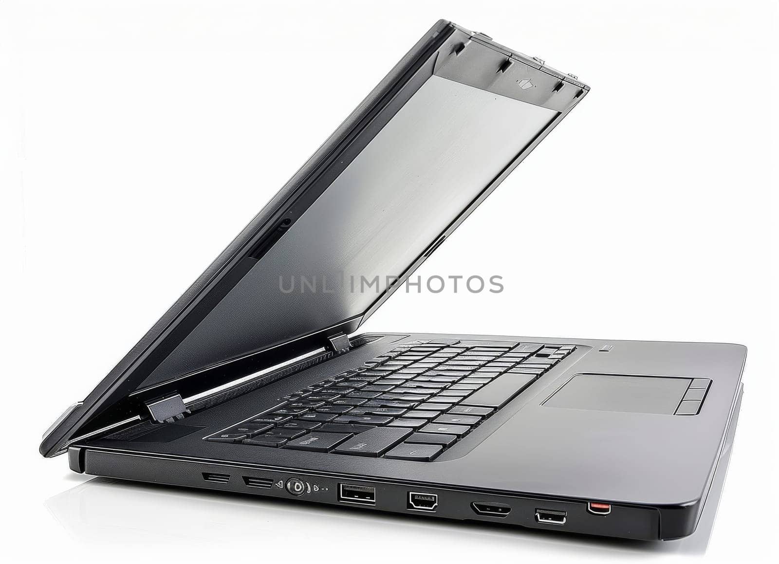 A modern, slim laptop stands open and ready for use against a stark white background, awaiting input.
