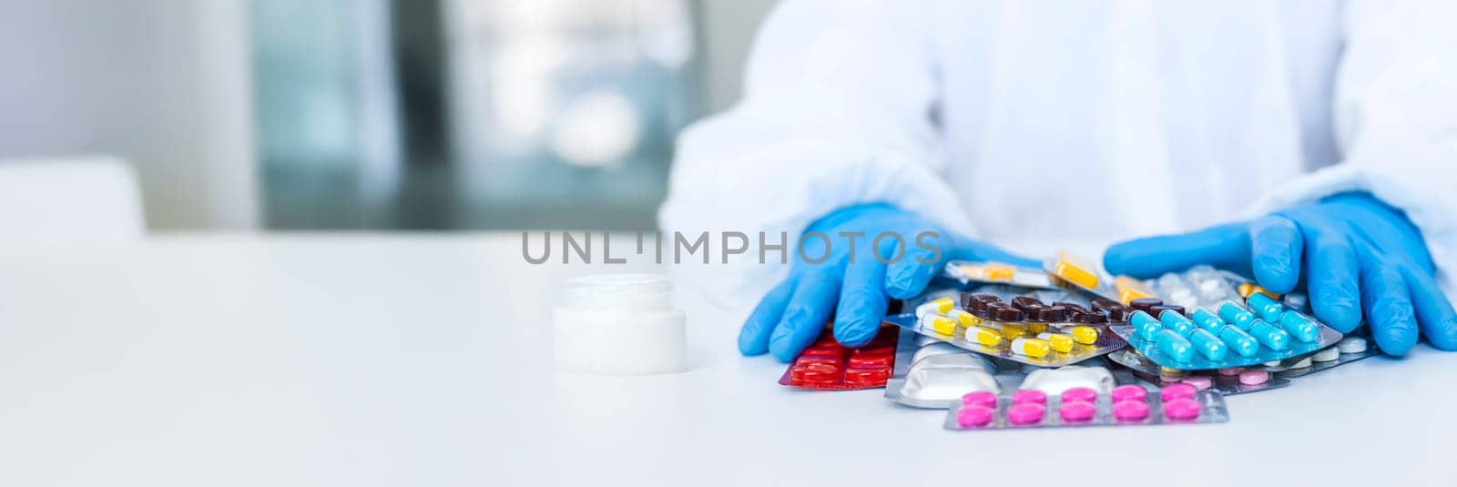 medicines in the hands of a doctor. Selective focus. pills.