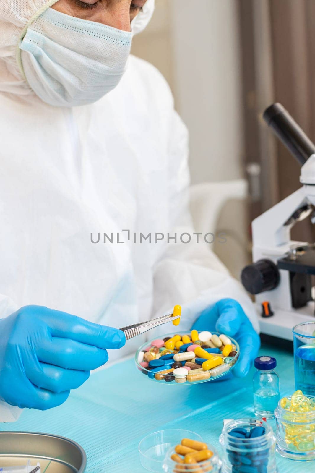 examine drugs in the laboratory. Selective focus. pills.