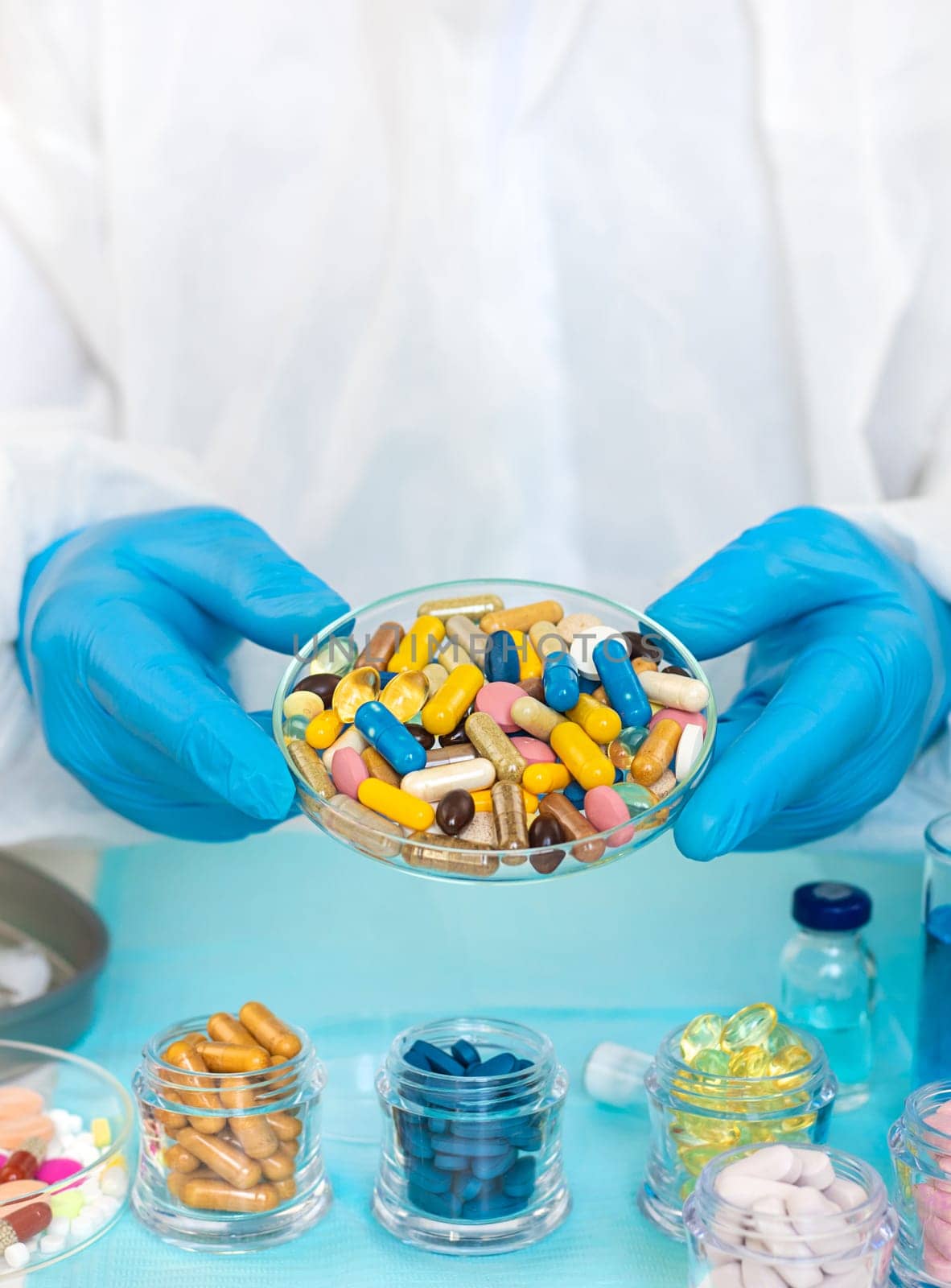 examine drugs in the laboratory. Selective focus. pills.