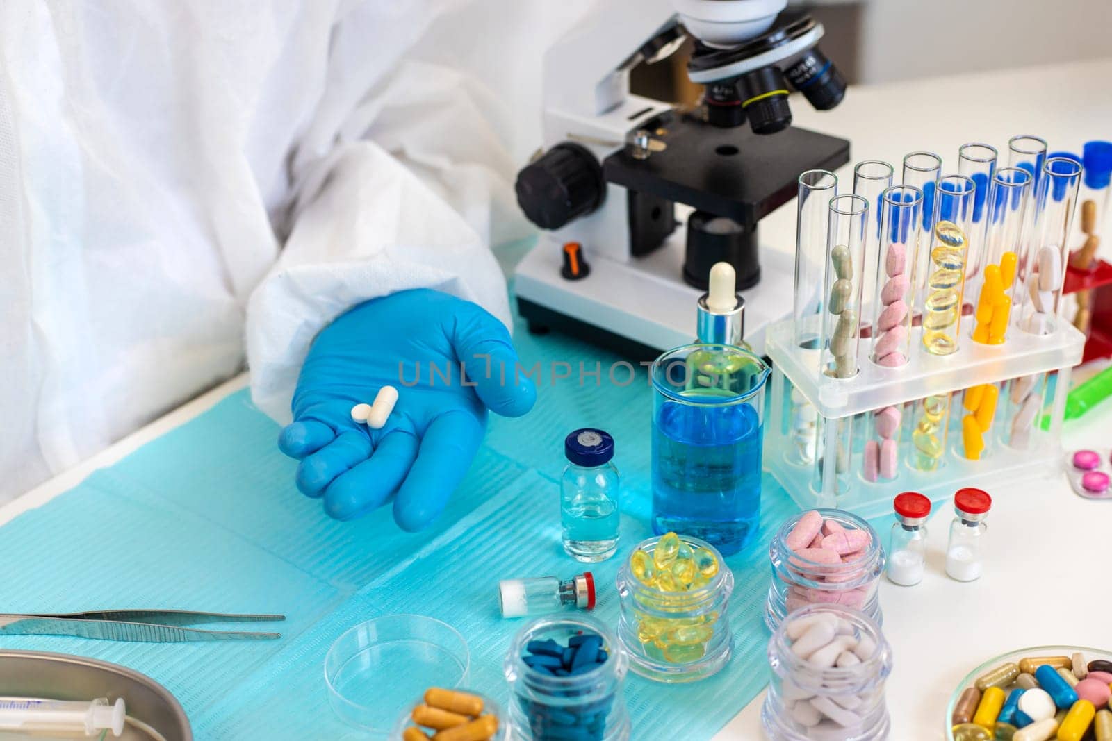 examine drugs in the laboratory. Selective focus. pills.
