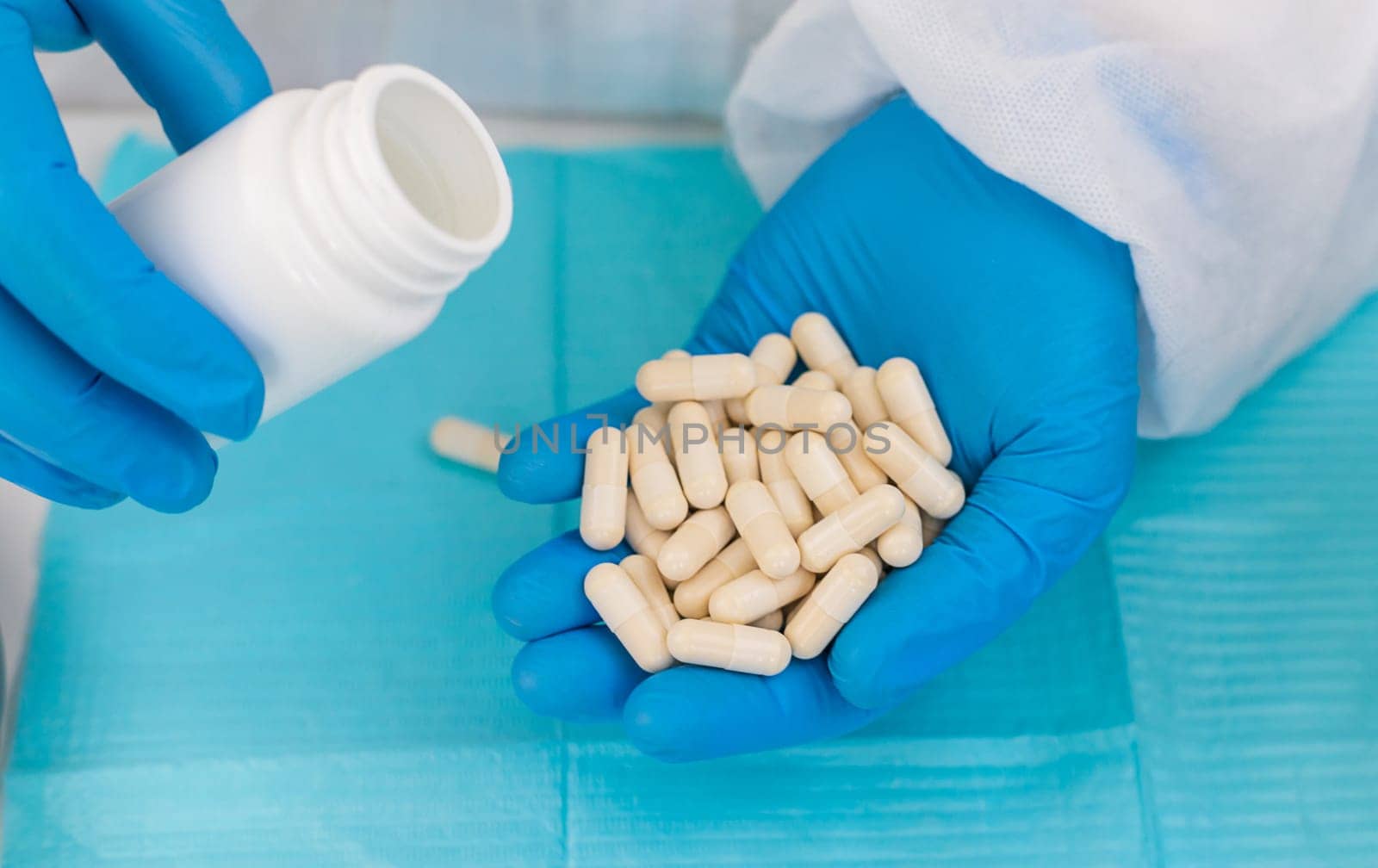 medicines in the hands of a doctor. Selective focus. pills.