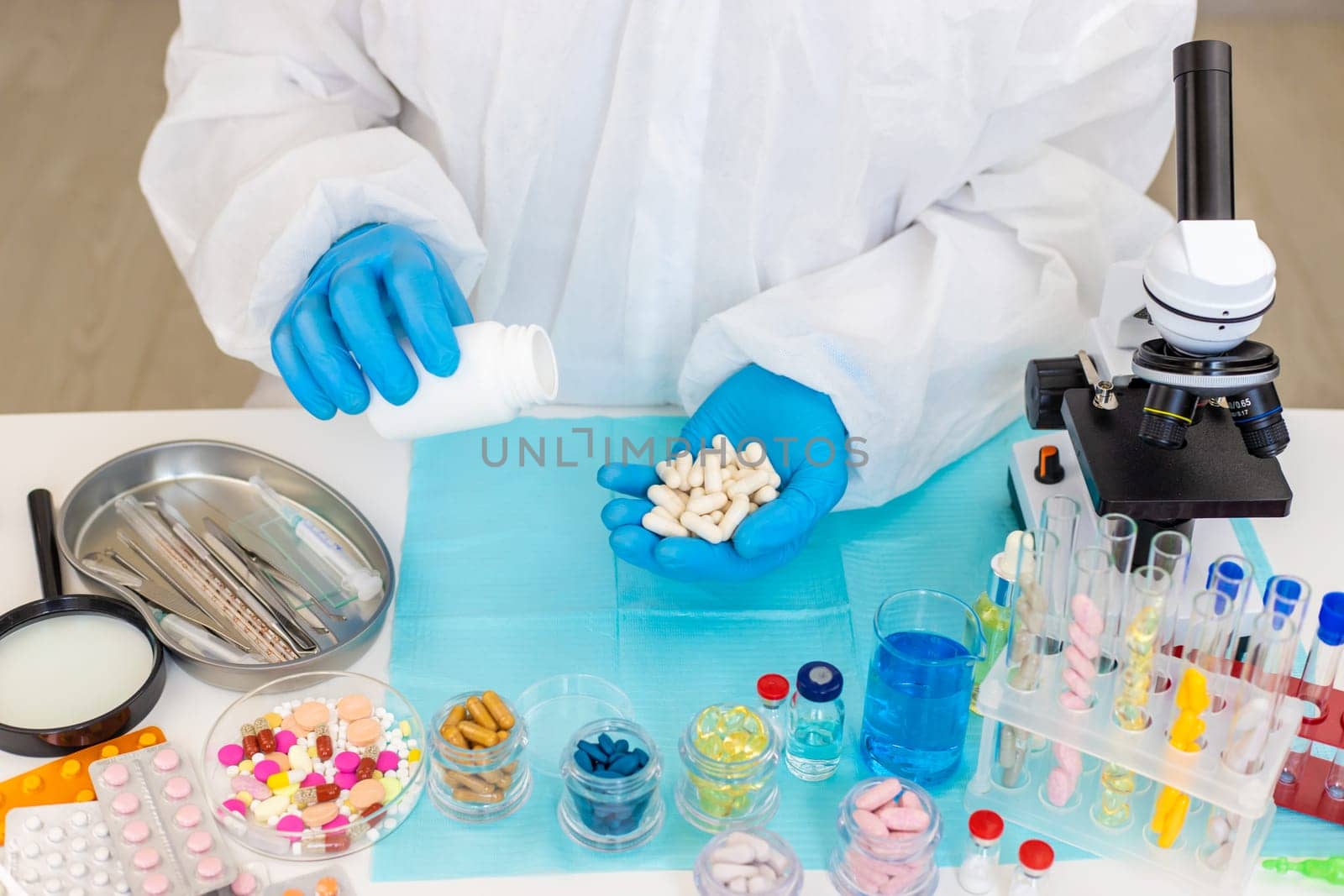 examine drugs in the laboratory. Selective focus. pills.