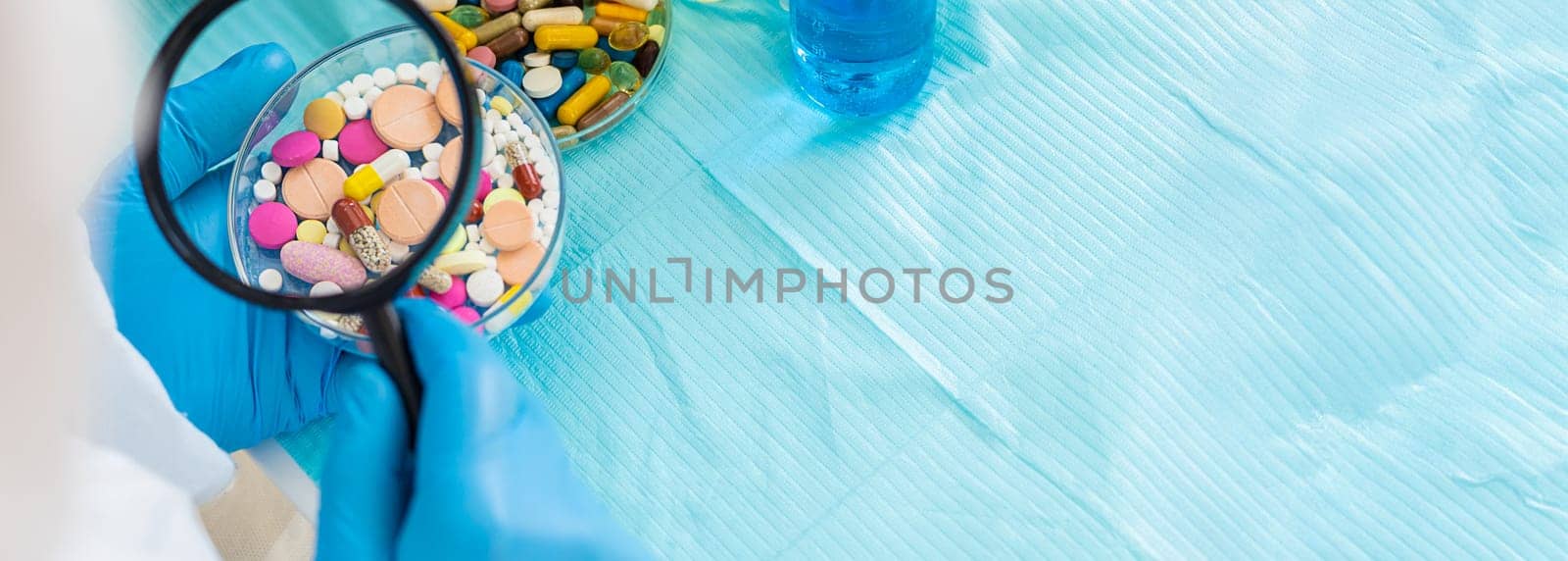 examine drugs in the laboratory. Selective focus. pills.