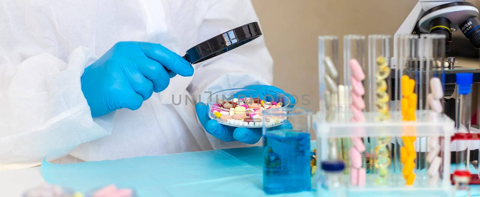 examine drugs in the laboratory. Selective focus. pills.