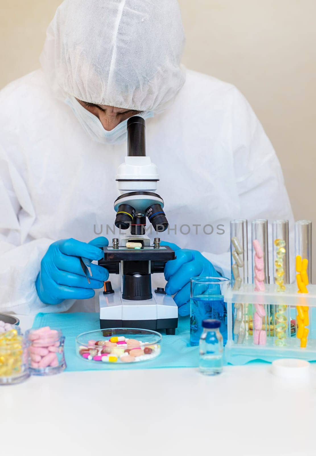 examine drugs in the laboratory. Selective focus. pills.