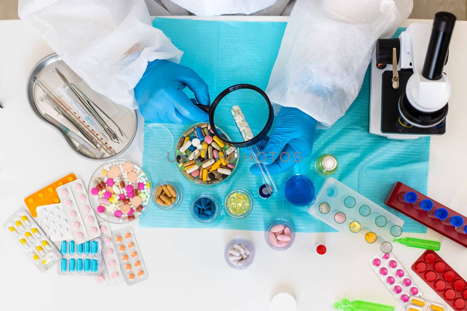 examine drugs in the laboratory. Selective focus. pills.