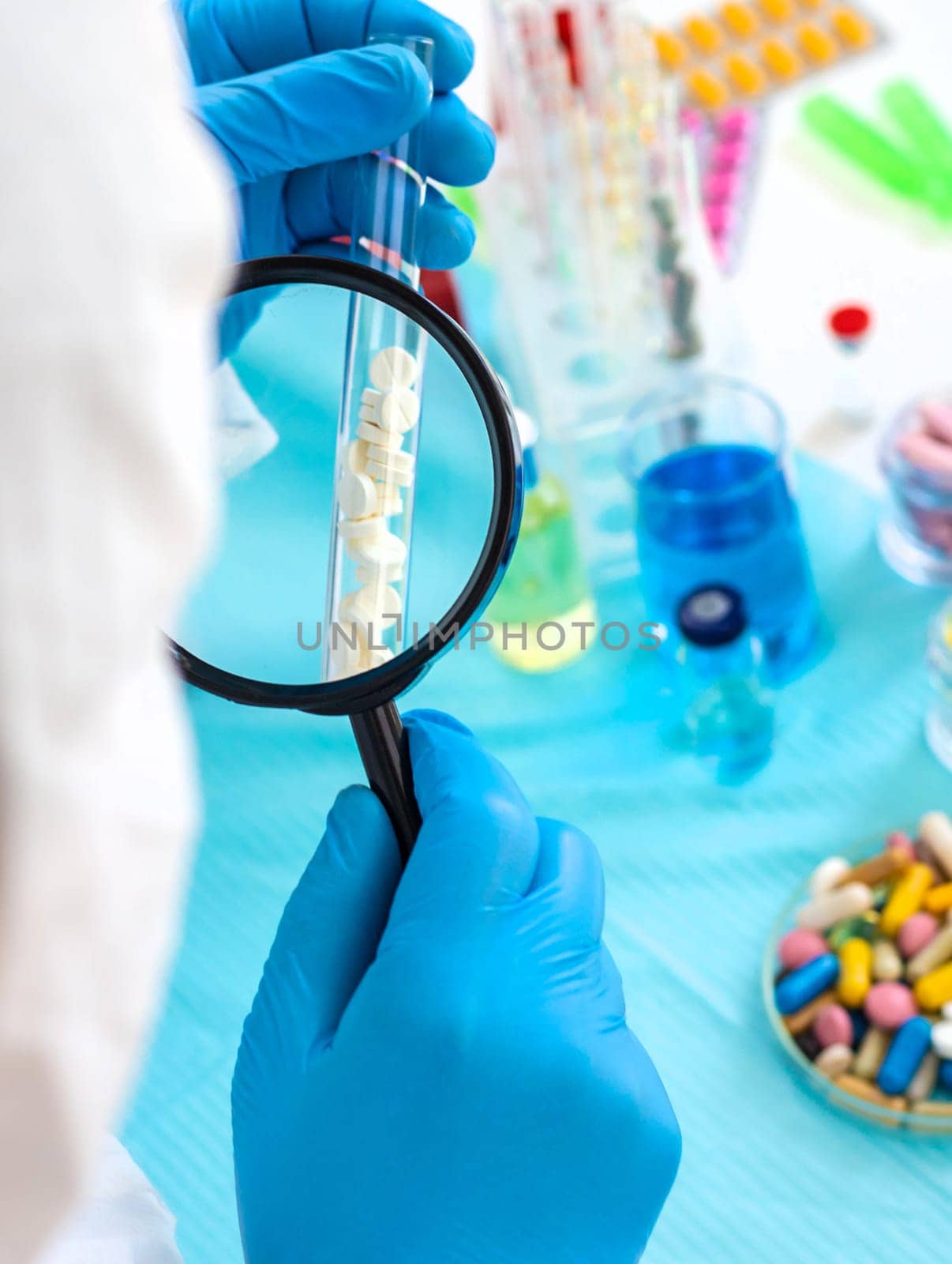 examine drugs in the laboratory. Selective focus. pills.