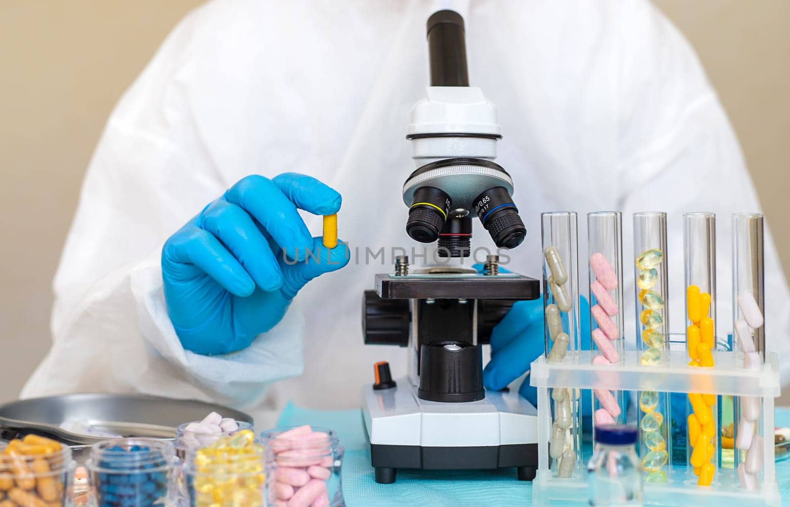 examine drugs in the laboratory. Selective focus. pills.