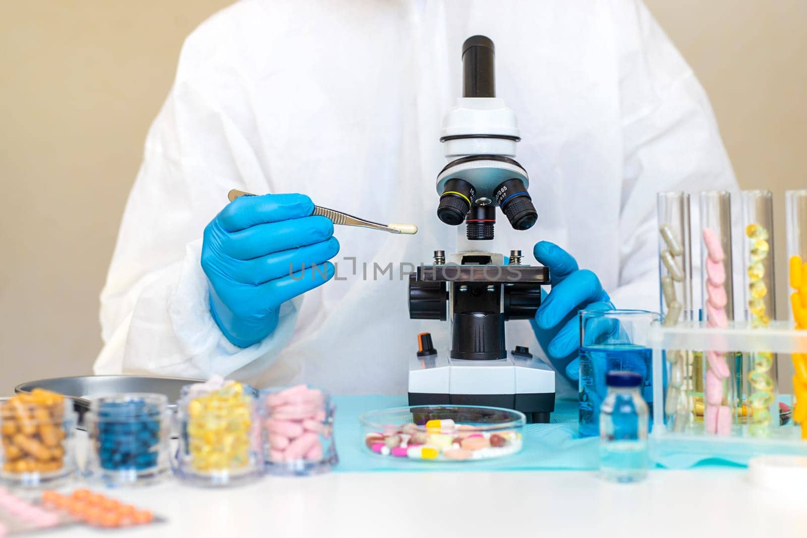 examine drugs in the laboratory. Selective focus. pills.