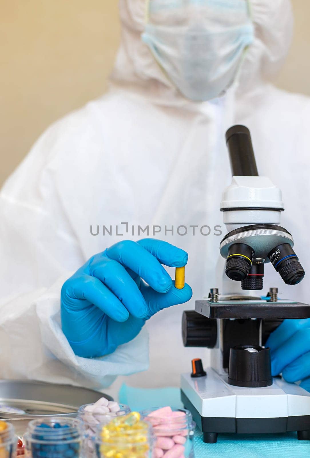 examine drugs in the laboratory. Selective focus. pills.