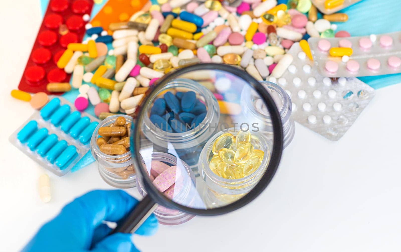 examine drugs in the laboratory. Selective focus. pills.
