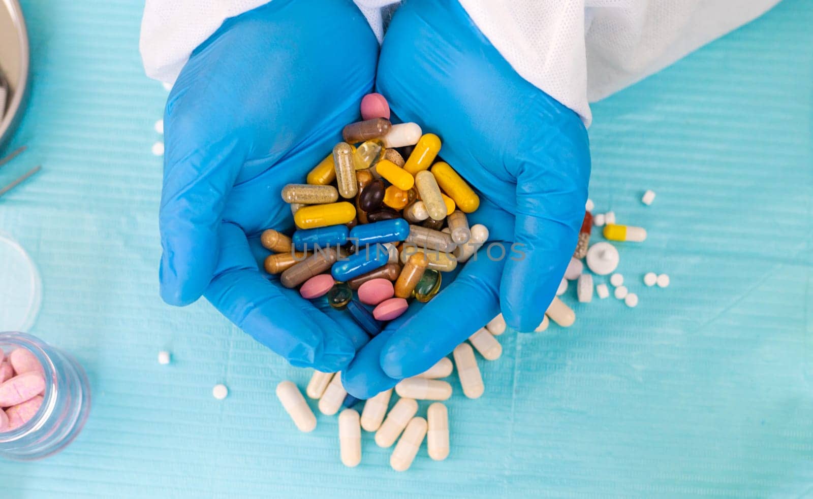 medicines in the hands of a doctor. Selective focus. pills.