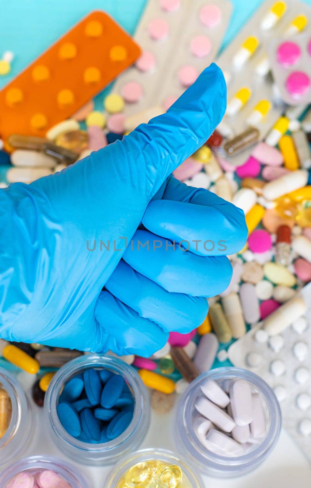 medicines in the hands of a doctor. Selective focus. pills.