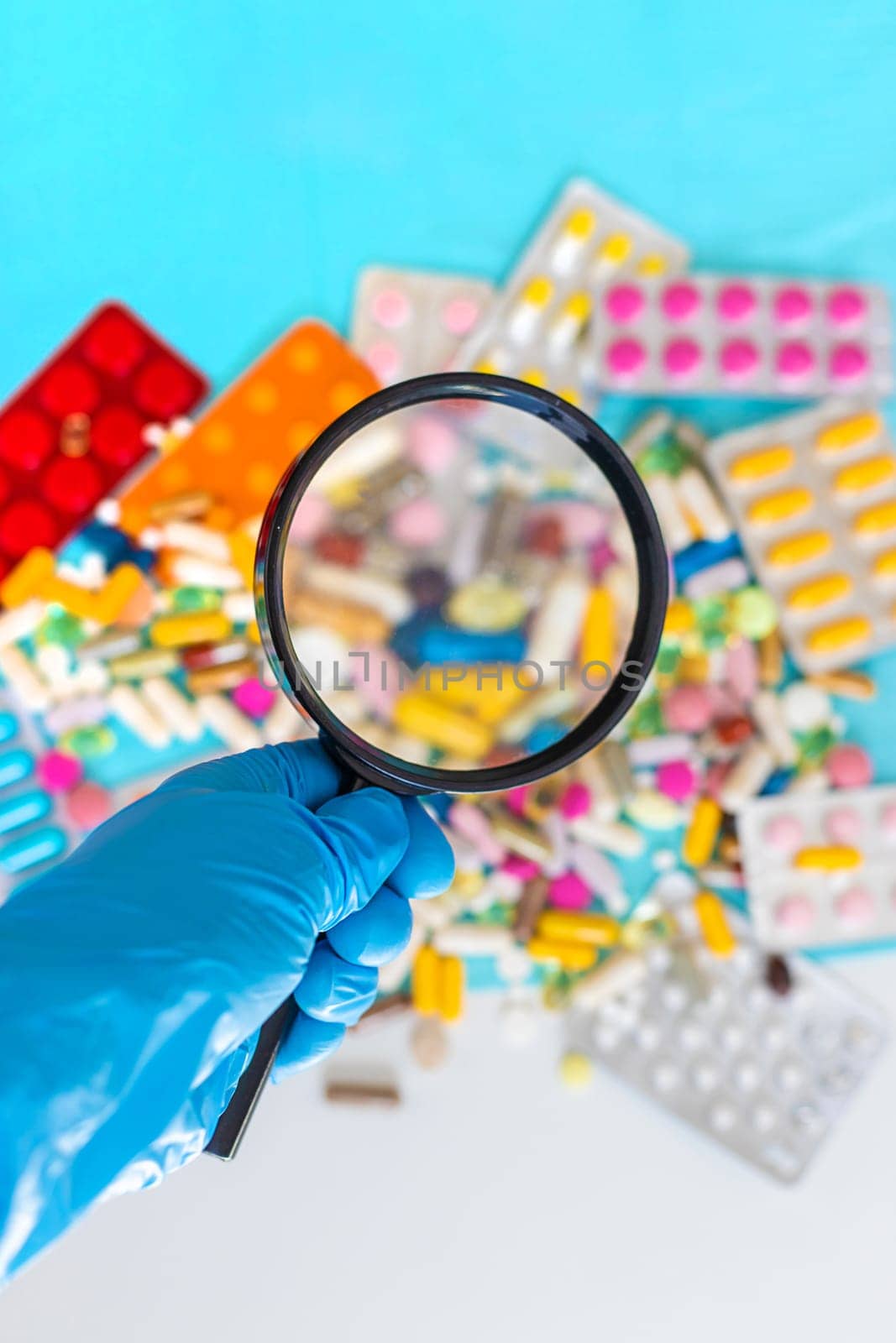 examine drugs in the laboratory. Selective focus. pills.