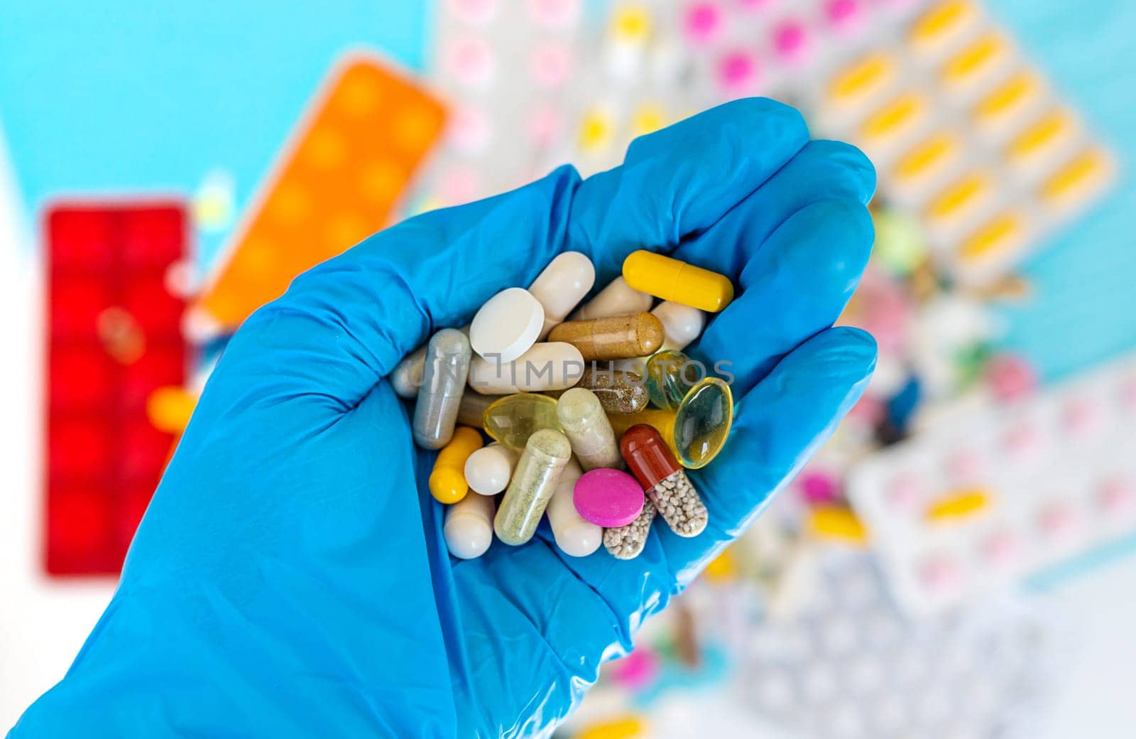 medicines in the hands of a doctor. Selective focus. pills.