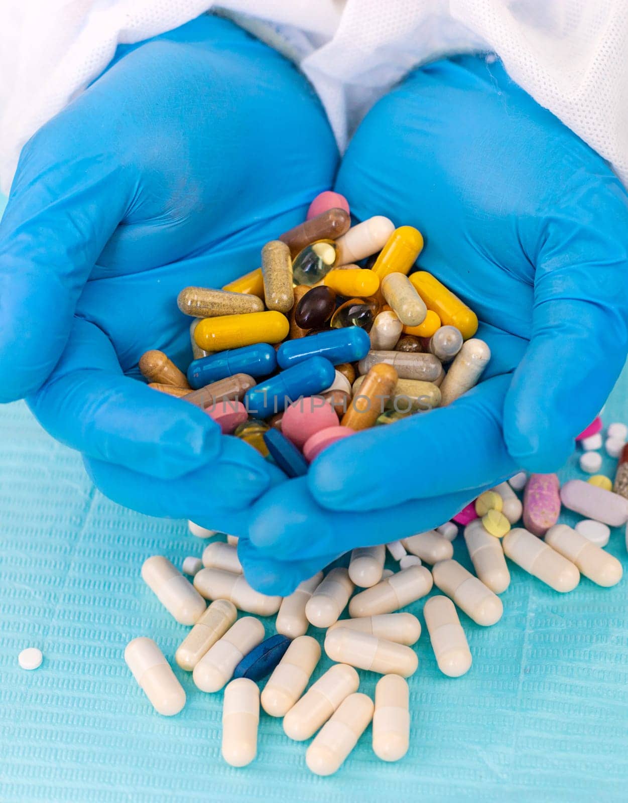 medicines in the hands of a doctor. Selective focus. pills.