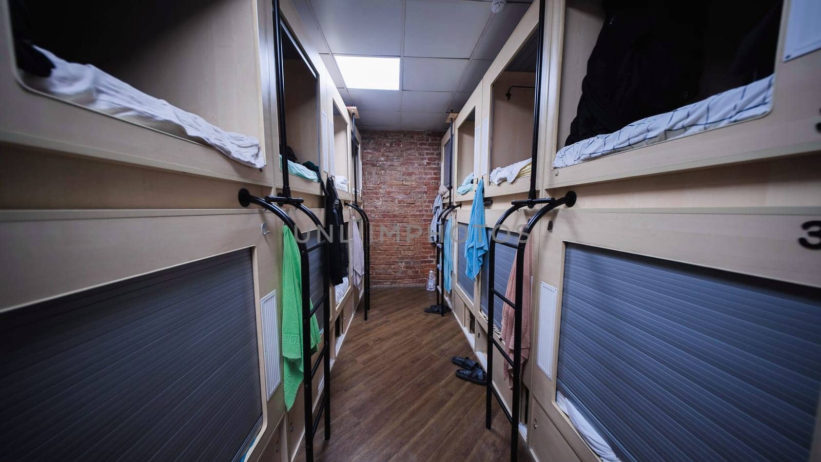 Capsule hotel rooms offering comfortable and private sleeping spaces for travelers seeking budget-friendly accommodation