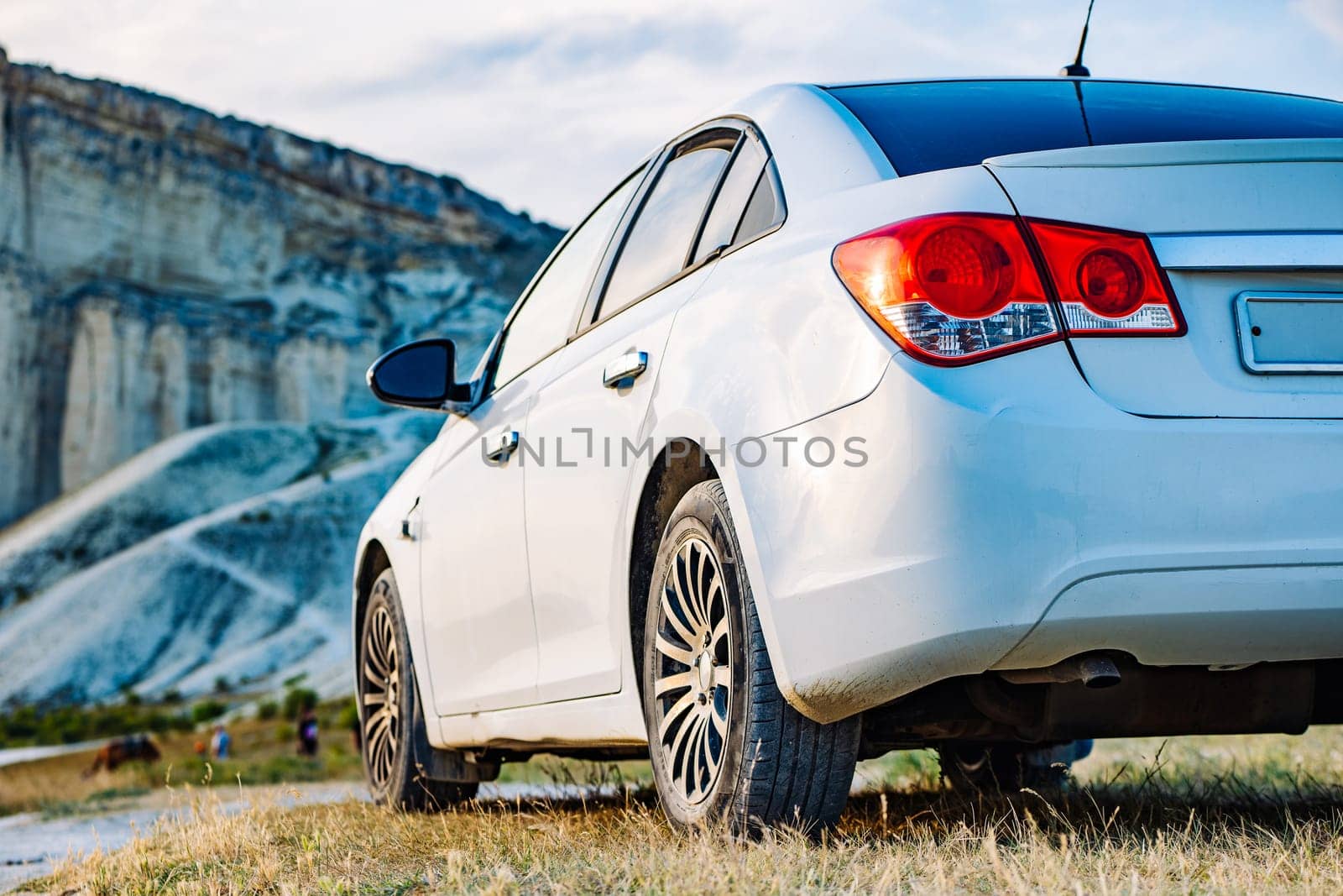 hite car parked near White Rock mountain in Crimea.