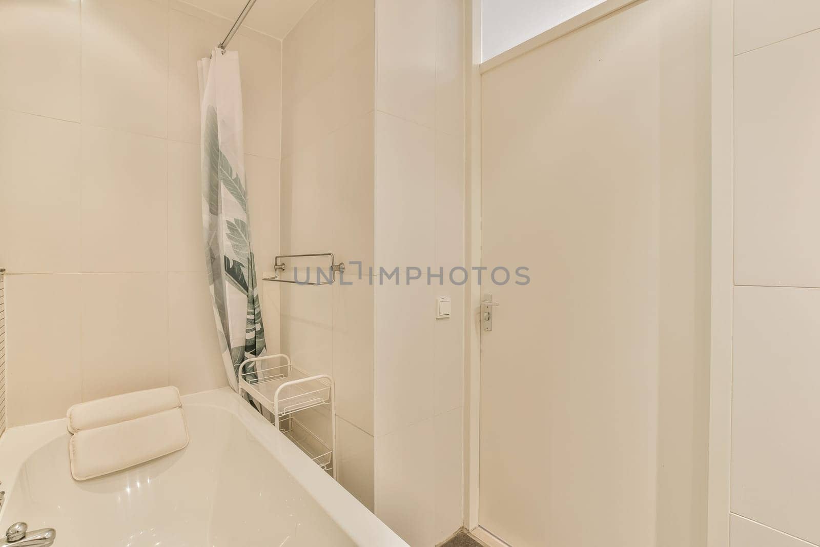 a bathroom with a bathtub and toilet in the corner, next to a shower stall on the right side