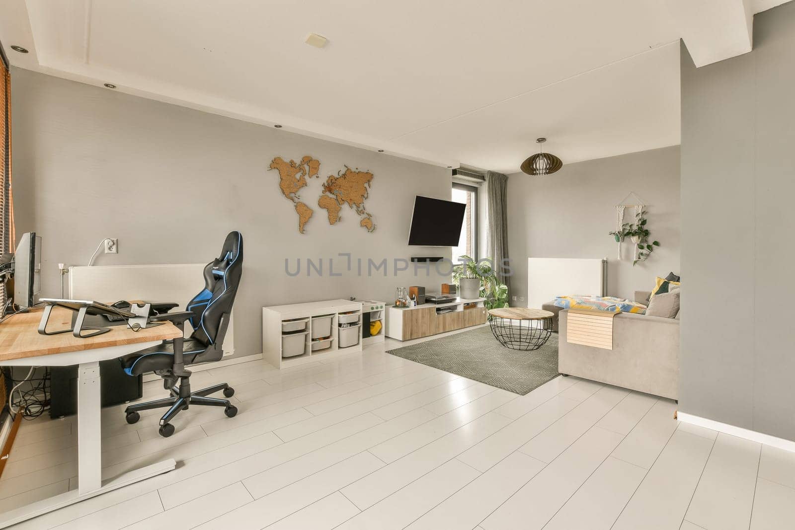 an office space with desks, chairs and a large map on the wall in the room is very clean