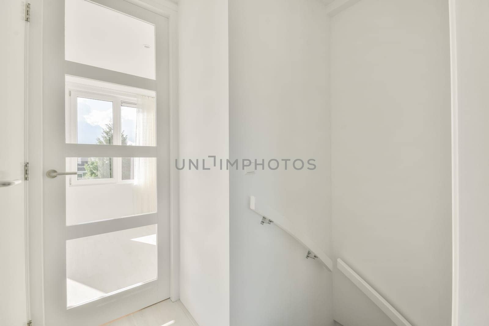 the inside of a house with white walls and wood flooring in an empty room that has been used for several years