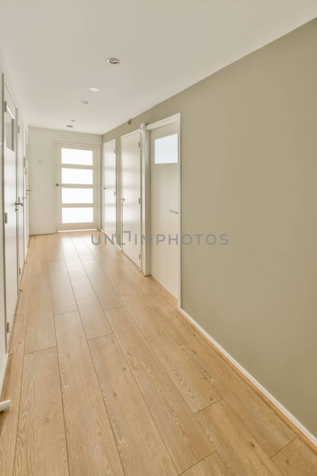 an empty living room with wood flooring and white trim on the walls in this photo is taken to the right