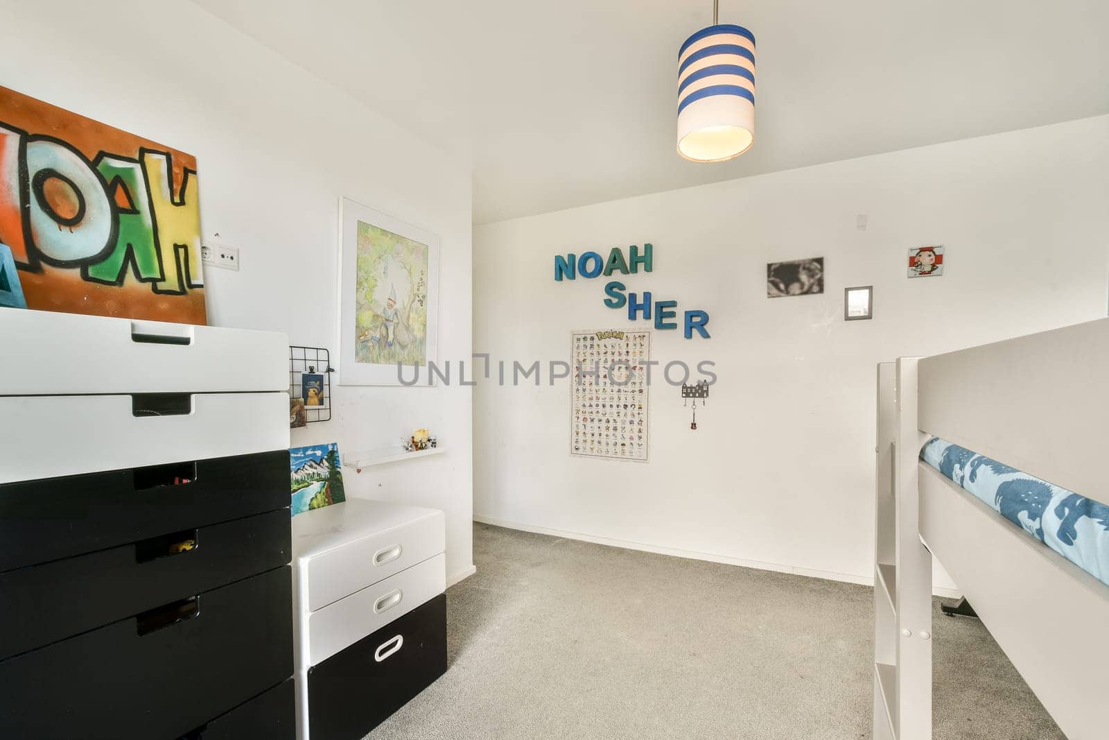 A modern children's room featuring playful decorations, vibrant colors, and organized storage. Ideal for a young child with personalized touches.