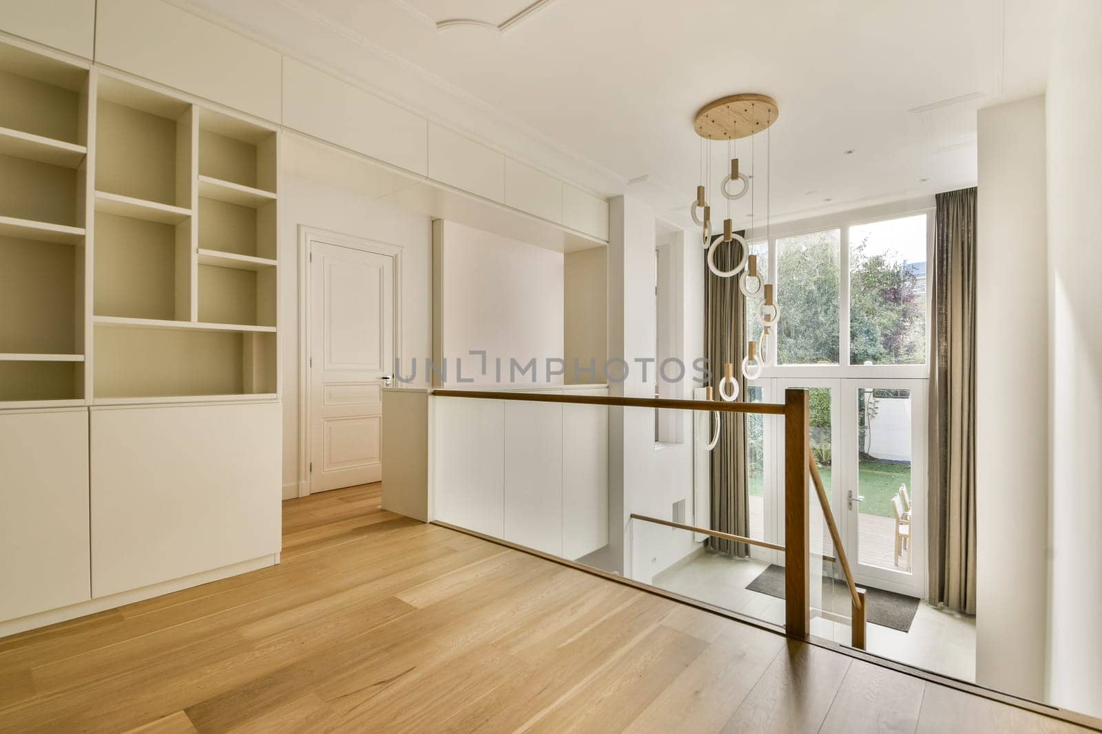 Spacious interior featuring sleek lines, ample natural light, and minimalist decor. A perfect blend of contemporary style and comfort in a living space.