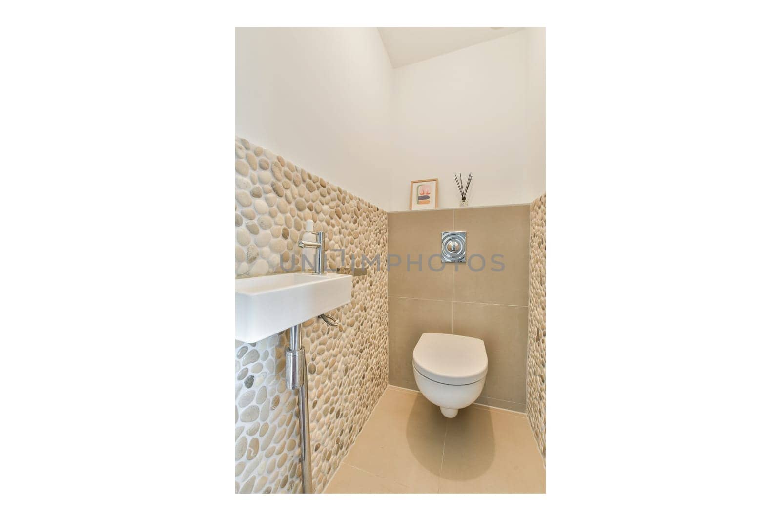 A contemporary bathroom design featuring stylish stone walls, a sleek toilet, and minimalist decor highlighting modern aesthetics.
