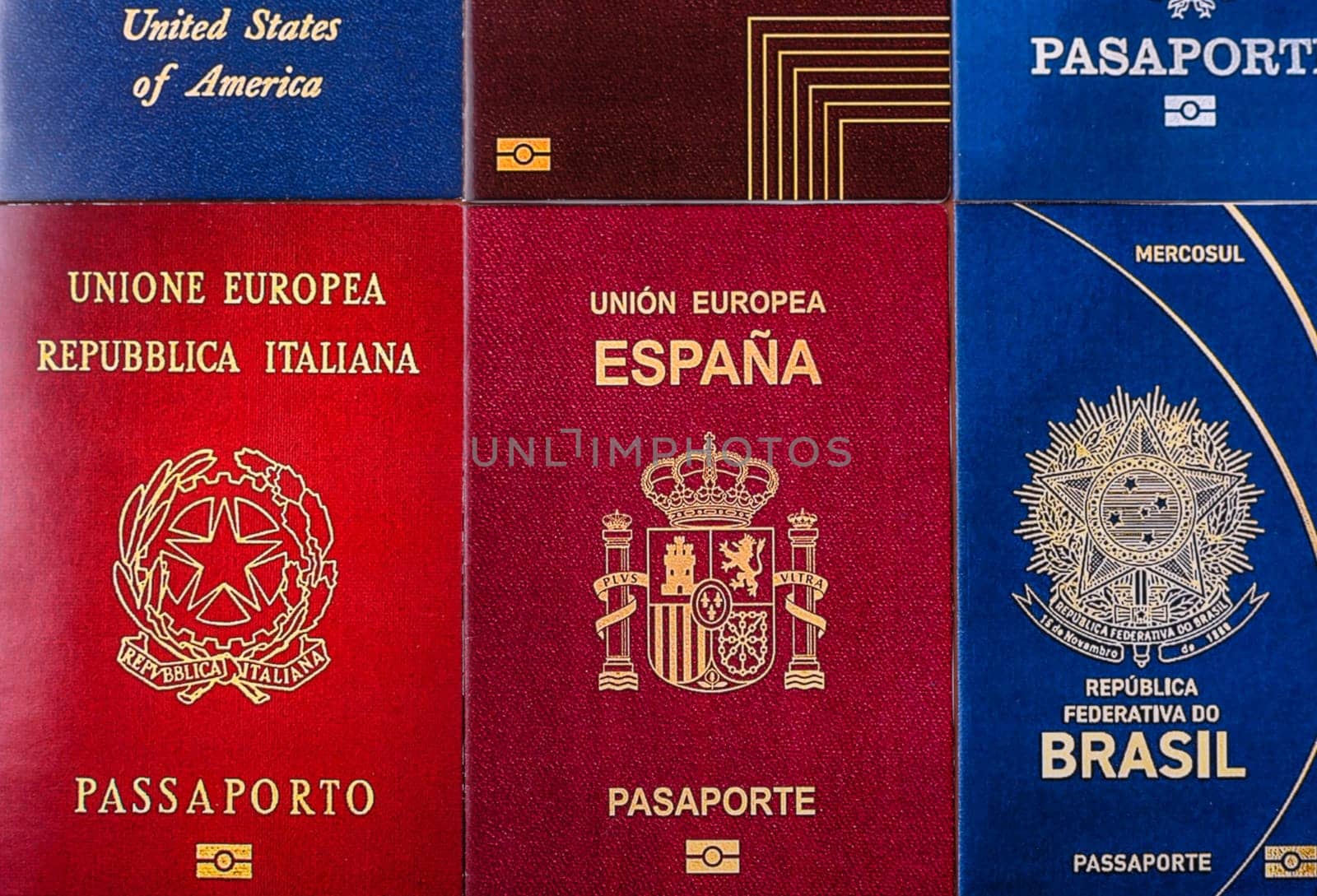Passports of citizens of different countries of the world, background consisting of passports of several countries.