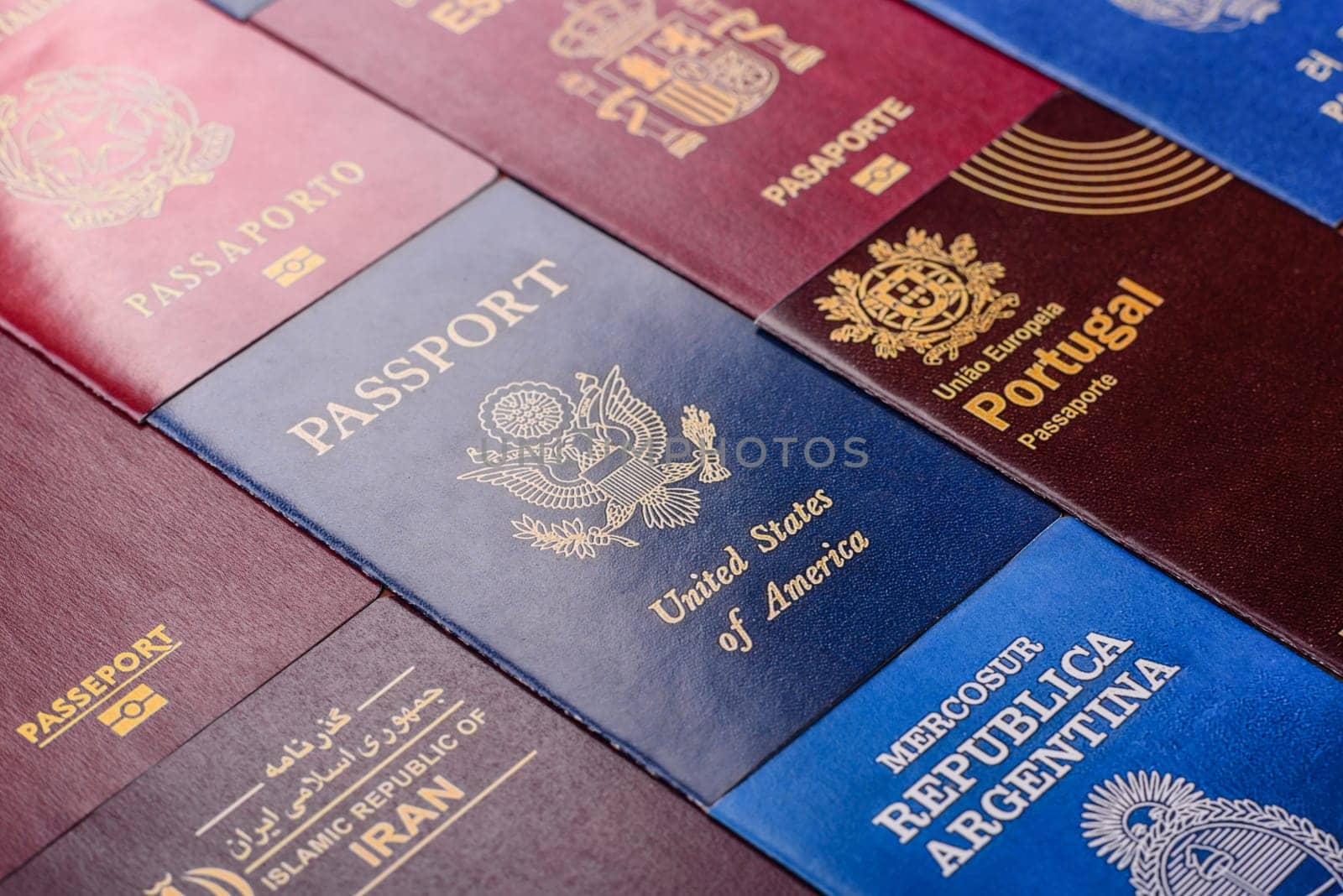 Passports of citizens of different countries of the world, background consisting of passports of several countries.