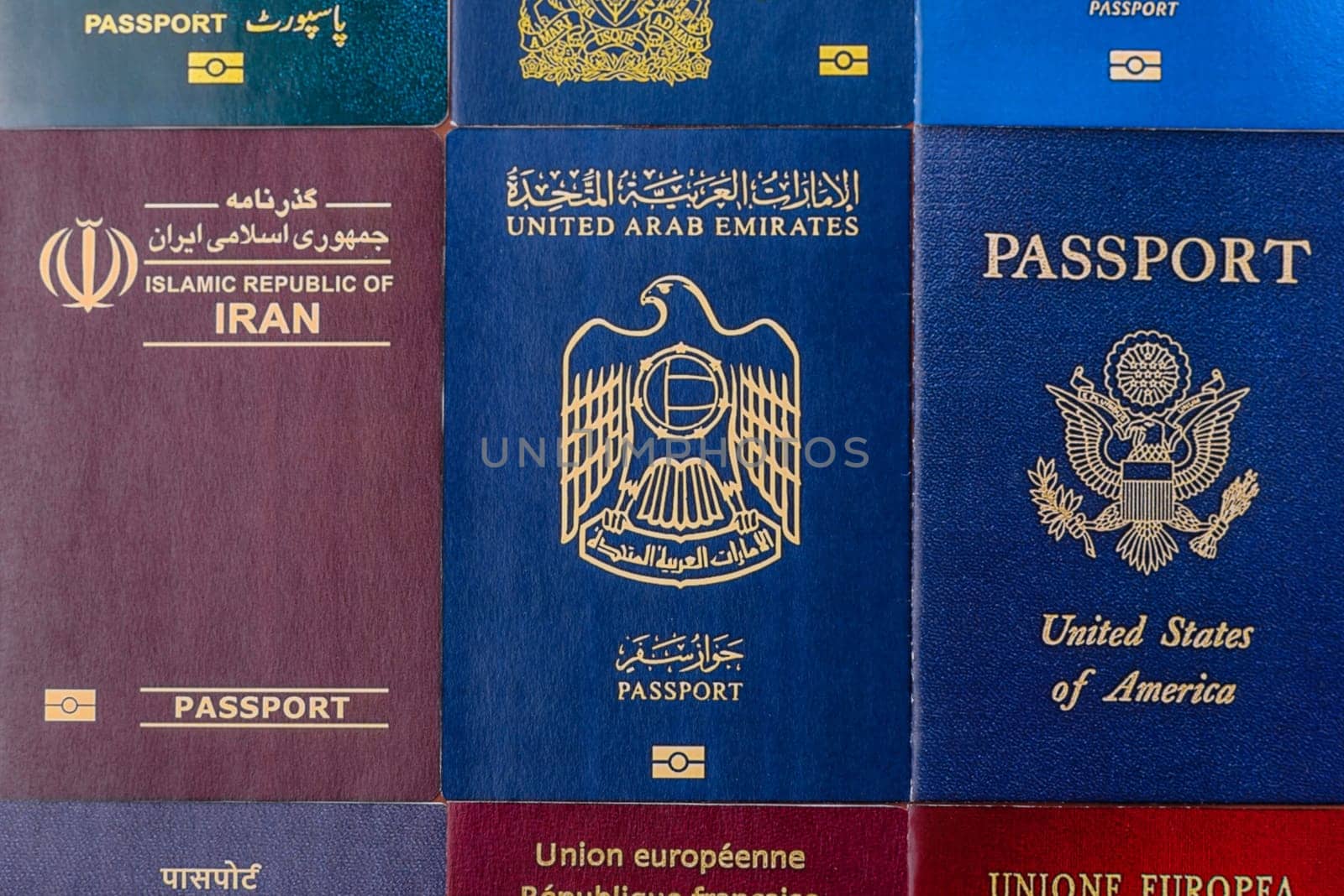 Passports of citizens of different countries of the world, background consisting of passports of several countries.
