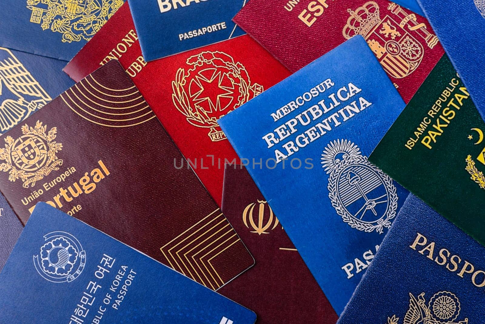 Passports of citizens of different countries of the world, background consisting of passports of several countries.