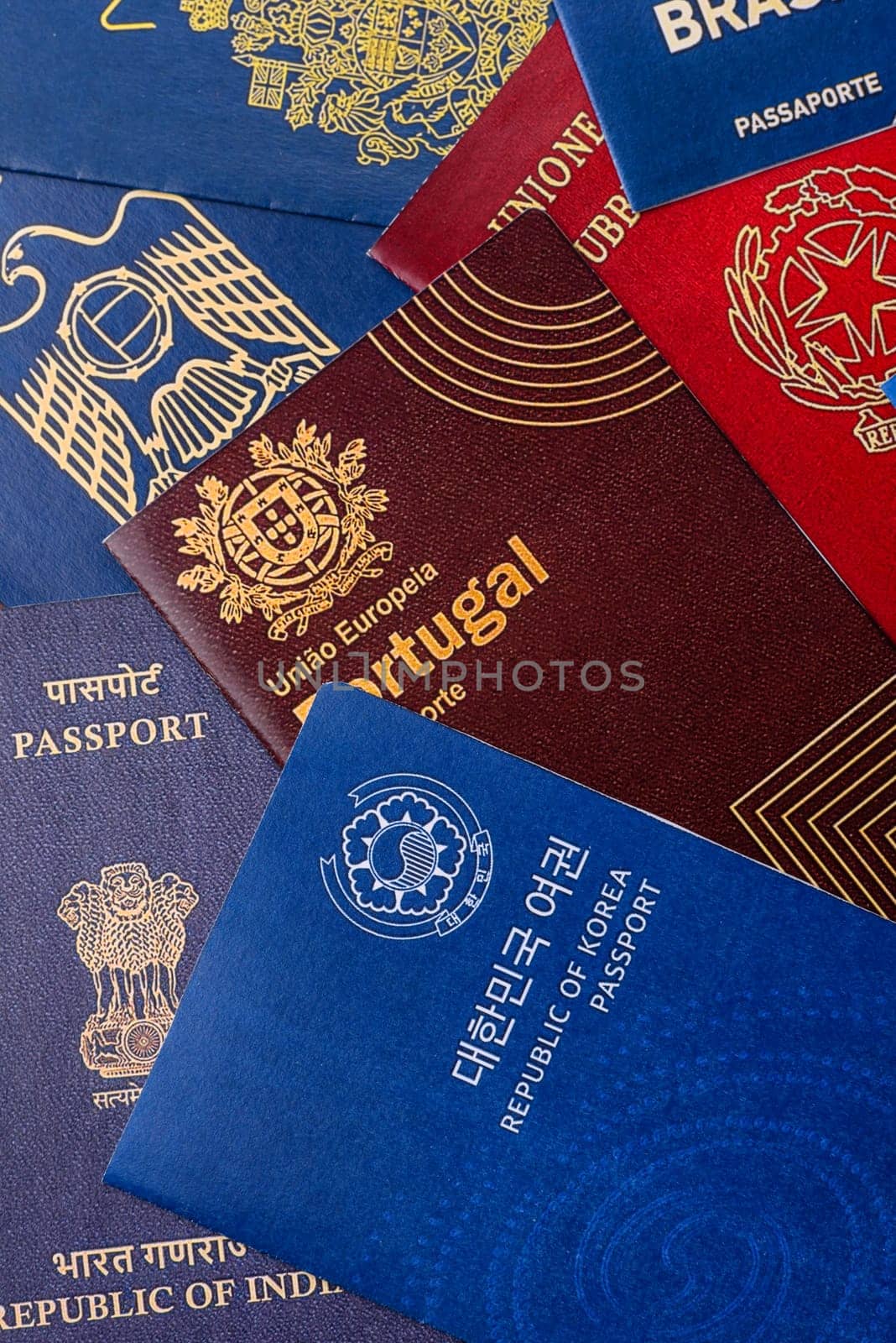 Passports of citizens of different countries of the world, background consisting of passports of several countries.